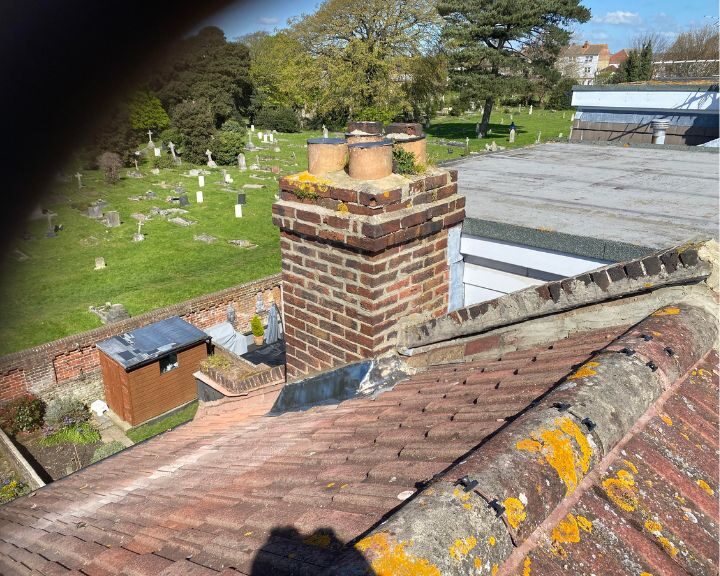 Chimney that has had the lead flashing replaced as part of a chimney repair