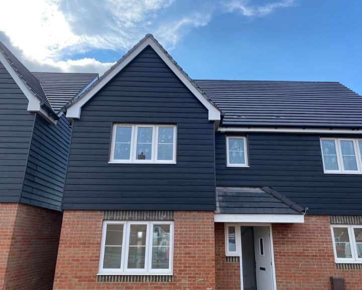 New composite cladding installed on a new build residential property