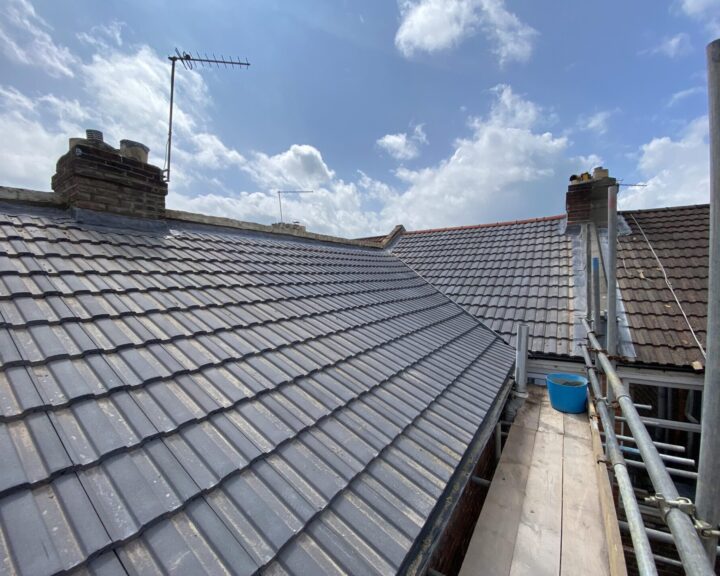 New pitched roof installation with grey tiles